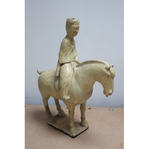 332 - Two Chinese straw-glazed equestrian groups, possibly Sui dynasty, each horse modelled on four legs r... 