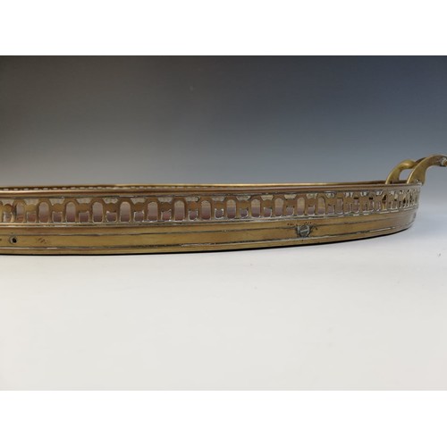 589 - A George III inlaid mahogany oval tray, with a pierced brass gallery and brass side handles, inlaid ... 