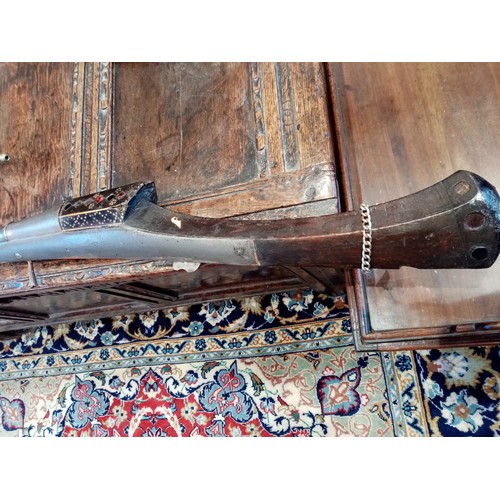 77 - A Replica Jezail flintlock musket, with a hardwood stock and a 119cm long steel barrel, total length... 