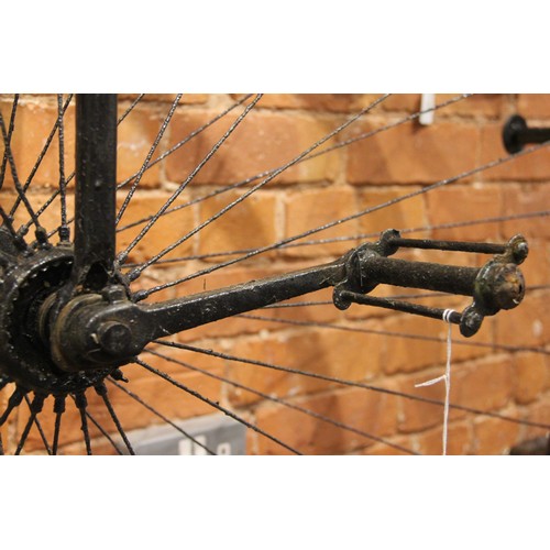 79 - A late 19th/early 20th century and later, Penny Farthing bicycle, the 122cm spoked wheel mounted wit... 