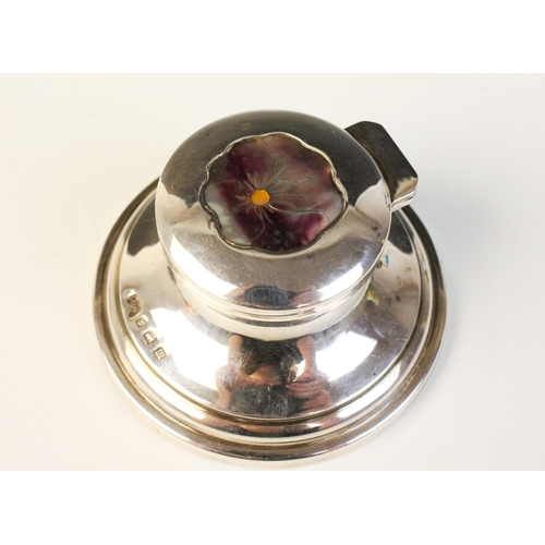 104 - A George V silver mounted miniature capstan inkwell, possible Henry Matthews, Birmingham 1911, of ty... 