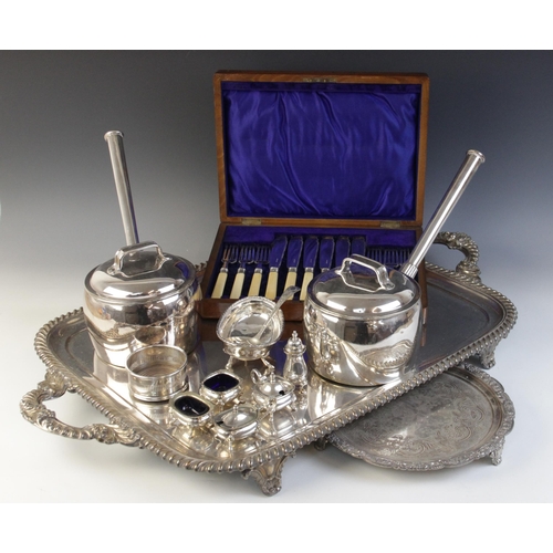 125 - A large twin-handled silver plated presentation tray, of rounded rectangular form with gadroon borde... 