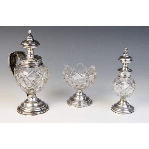 21 - A 19th century Dutch silver mounted cut glass cruet set, comprising mustard pot, pepperette and open... 