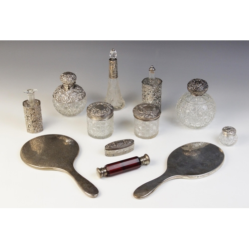 60 - A Victorian cut glass silver mounted dressing table jar, Male & Jones, Birmingham 1898, of globular ... 