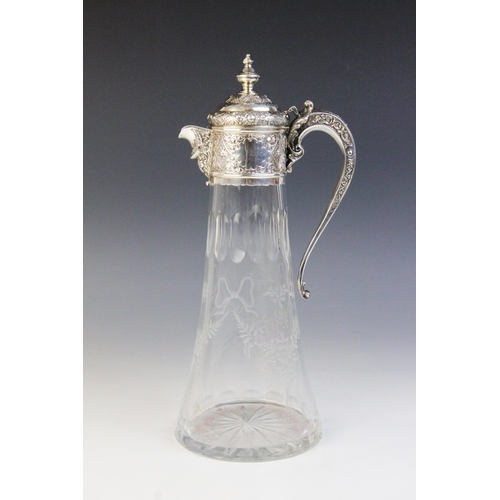 65 - A Victorian silver mounted glass claret jug, Charles Edwards, London 1888, of tapering form with sta... 