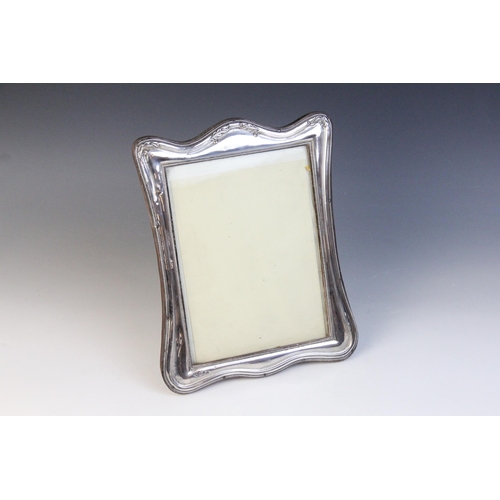 67 - A George V silver mounted photograph frame, Charles Boyton & Son Ltd, Birmingham 1918, of rectangula... 