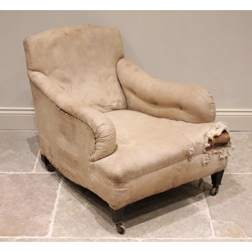 701 - A 19th century Howard type chair armchair, with a deep set seat and long padded arms over the sprung... 