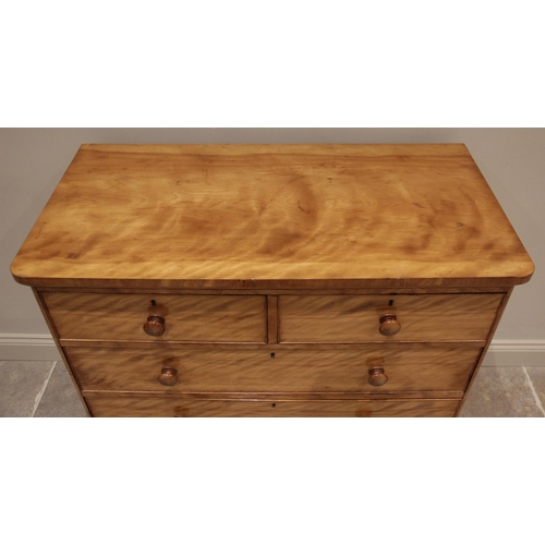 703 - A Victorian satin birch chest of drawers, finished with a tiger stripe patina, the rectangular top w... 