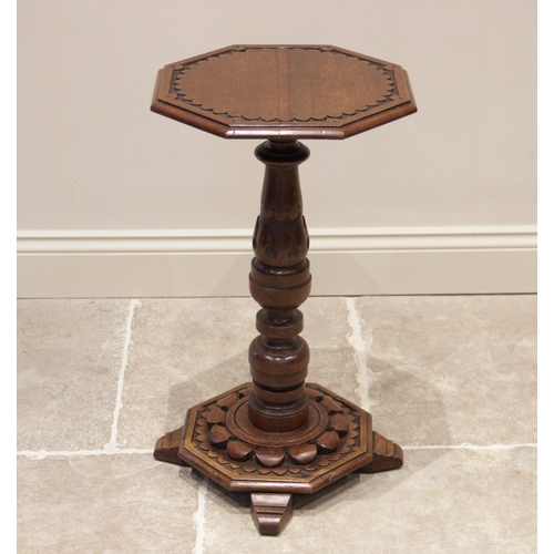 723 - A late 19th/early 20th century Arts and Crafts oak pedestal table in the manner of Bridgens, the oct... 