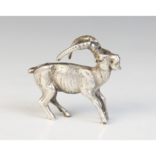 86 - A silver coloured model of an Ibex goat, in the manner of Patrick Mavros, with realistic fur effect ... 