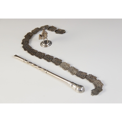 7 - An Asian silver coloured belt, comprising cast links, each designed as a figure in an architectural ... 