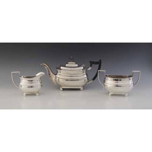 111 - A George V three-piece silver tea service by William Hutton & Sons, Sheffield 1932, comprising teapo... 