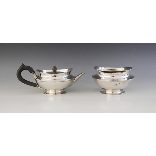 45 - A 19th century Dutch silver teapot and sucrier, stamped 'ICH' with retailers mark for 'DIEMONT', eac... 