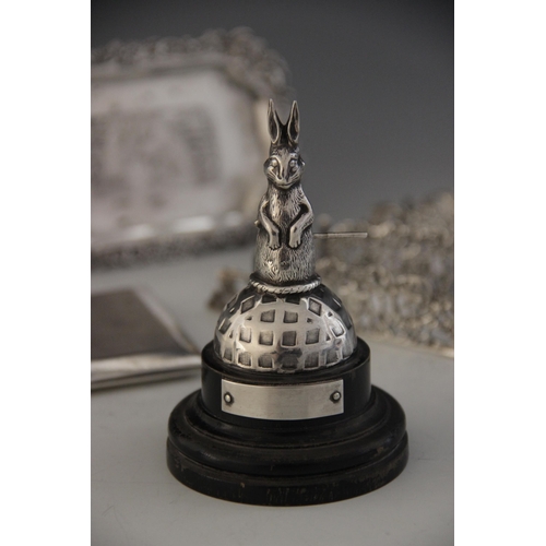 49 - A George V silver golfing trophy, Crisford & Norris Ltd, Birmingham 1930, in the form of a rabbit ho... 