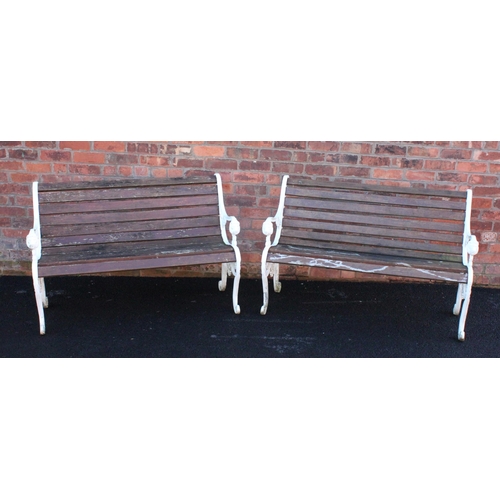 750 - A pair of 19th century style painted metal and slatted hardwood garden benches, late 20th century, t... 