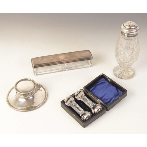 75 - A George V silver mounted capstan inkwell, A & J Zimmerman Ltd, Birmingham 1916, of plain polished c... 