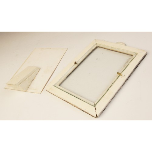 68 - A Victorian silver mounted photograph frame, William Comyns, London 1897, of rectangular form with s... 