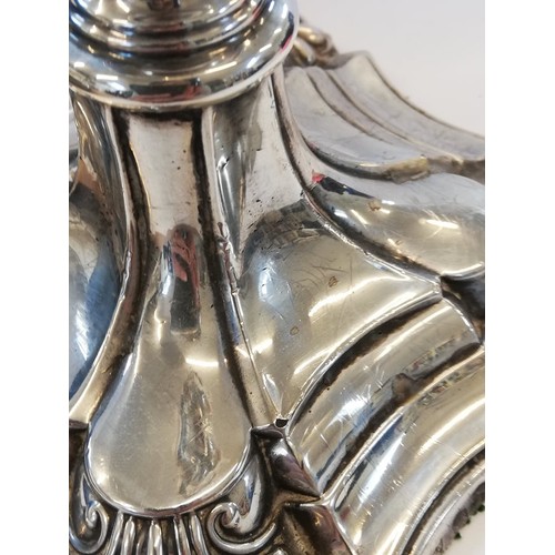 66 - A pair of George V silver mounted candlesticks, Ellis Jacob Greenberg, London 1926, each on shaped w... 