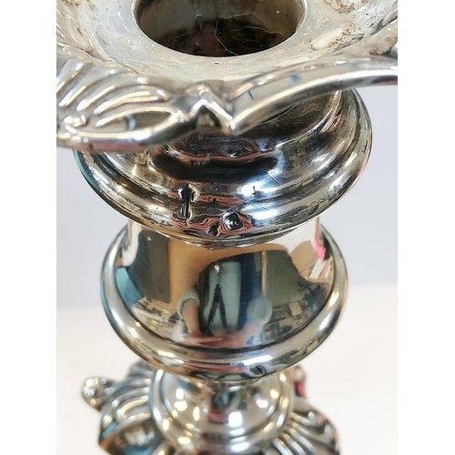 66 - A pair of George V silver mounted candlesticks, Ellis Jacob Greenberg, London 1926, each on shaped w... 