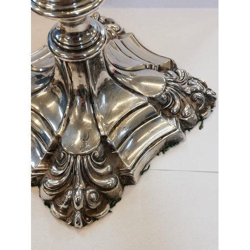 66 - A pair of George V silver mounted candlesticks, Ellis Jacob Greenberg, London 1926, each on shaped w... 