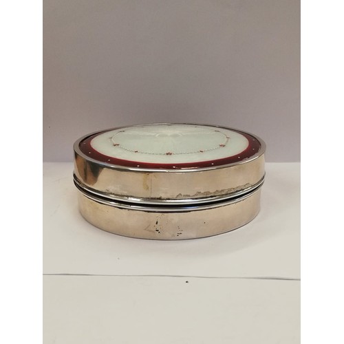 31 - An early 20th century Hungarian silver enamelled box, of circular form with red and white guilloche ... 