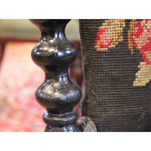 689 - A 19th century ebonised bobbin turned chair, with floral tapestry upholstered back rest and seat, ra... 