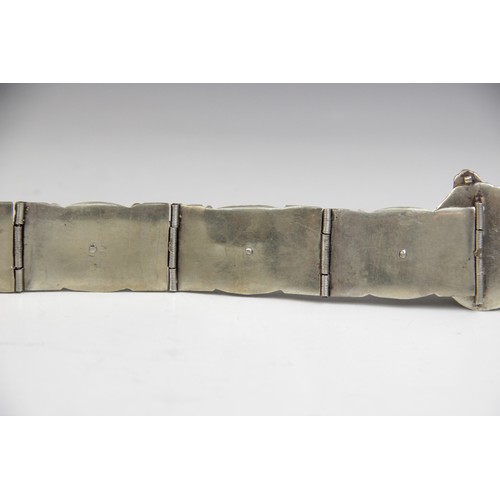 85 - An Armenian silver coloured niello belt, each link designed as an oval panel decorated in niello wit... 