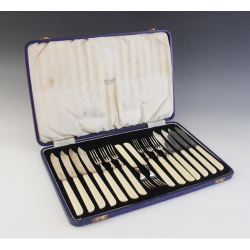 1 - A cased set of George VI silver bladed fruit knives and forks, John Sanderson & Son Ltd, Sheffield 1... 