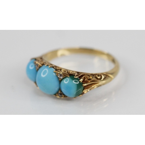 102 - A Victorian turquoise and diamond ring, the central round turquoise cabochon measuring 7.9mm diamete... 