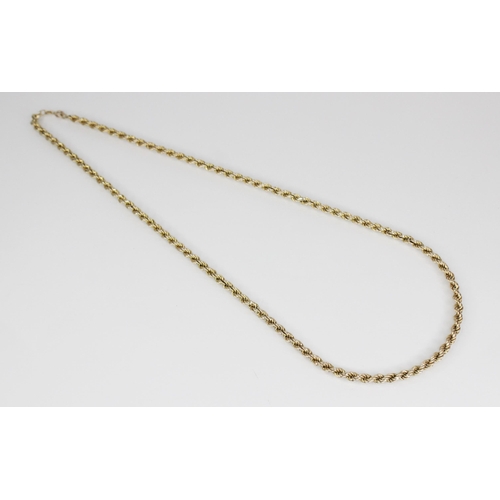 105 - A gold coloured rope twist chain, jump ring with 9ct gold import marks for London 1979, 61.5cm long,... 