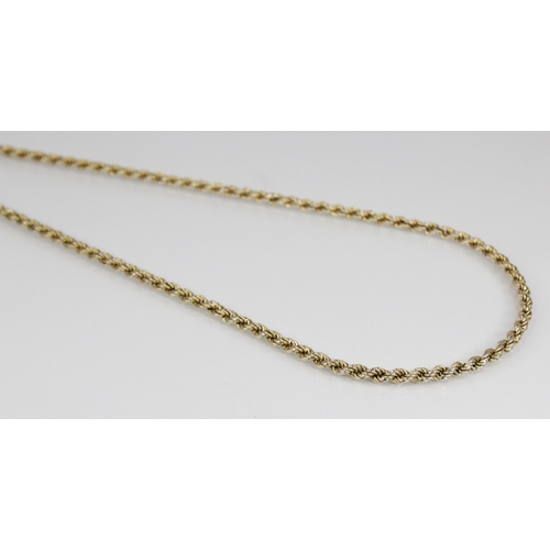 105 - A gold coloured rope twist chain, jump ring with 9ct gold import marks for London 1979, 61.5cm long,... 