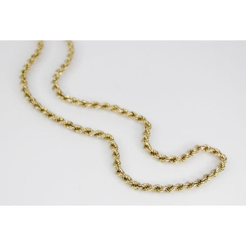 105 - A gold coloured rope twist chain, jump ring with 9ct gold import marks for London 1979, 61.5cm long,... 