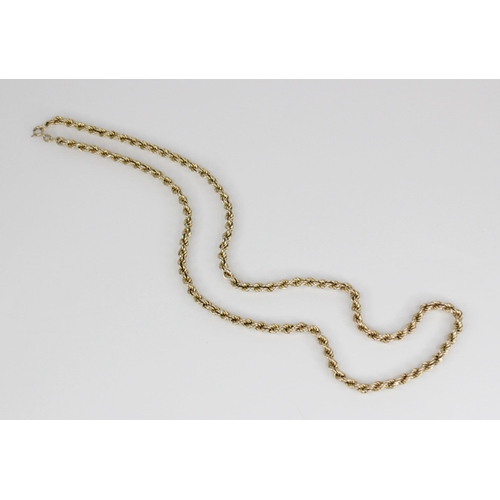 105 - A gold coloured rope twist chain, jump ring with 9ct gold import marks for London 1979, 61.5cm long,... 