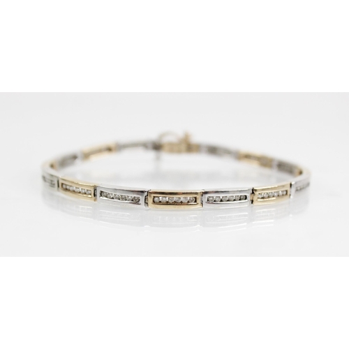 125 - A diamond set 9ct gold bracelet, comprising alternating yellow gold and white gold rectangular links... 