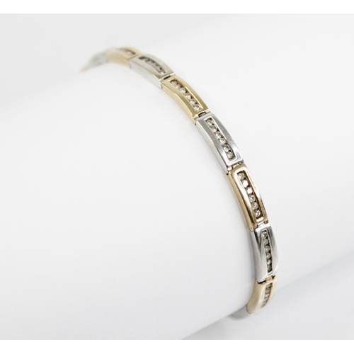 125 - A diamond set 9ct gold bracelet, comprising alternating yellow gold and white gold rectangular links... 