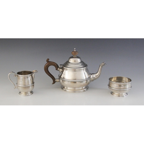 26 - A George V silver bachelor's tea service, Goldsmiths & Silversmiths Co Ltd, London 1922, each piece ... 
