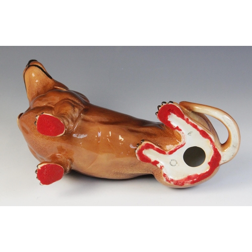 566 - A Beswick fireside dachshund, model No. 2286, in tan colourway, 17cm high