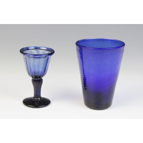 588 - A Bristol blue glass beaker, the wrythen body of tapering form, unpolished pontil, 10cm high, with a... 