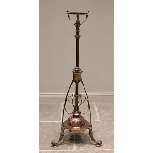 597 - A late 19th/early 20th century brass and copper Art Nouveau telescopic standard lamp, the central ad... 