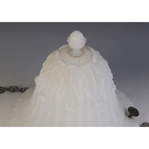 605 - An Edwardian milk glass ceiling light, the pendant bowl of campana urn form with half reeded body an... 