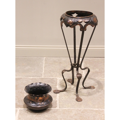 614 - An Art Nouveau Jugendstil type copper jardiniere and stand, early 20th century, the jardinere elabor... 