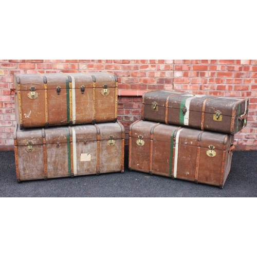 622 - Four wooden ribbed canvas trunks, early 20th century, each of typical domed form with leather side h... 