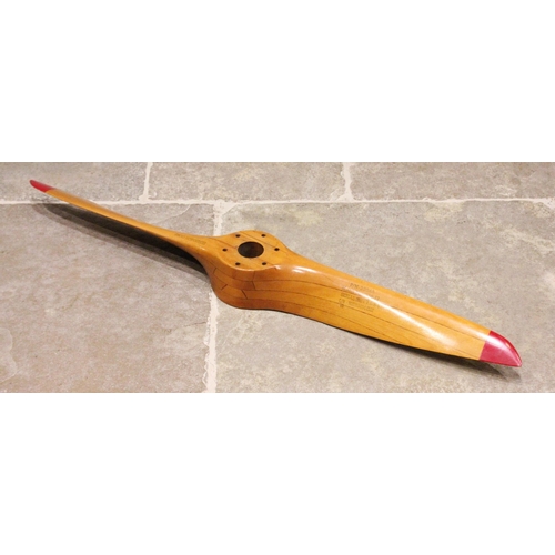 627 - An American laminated wooden propeller, possibly yellow birch or maple, stamped Sensenich Corp, P/N-... 