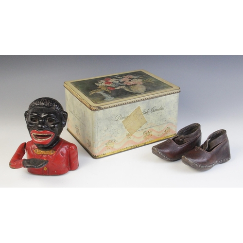 635 - A pair of children's leather shoes, late 19th/early 20th century, with ankle straps, 13.5cm long, a ... 