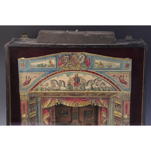 639 - A Victorian table top paper theatre, 19th century, with hand coloured proscenium arch, scenery and c... 