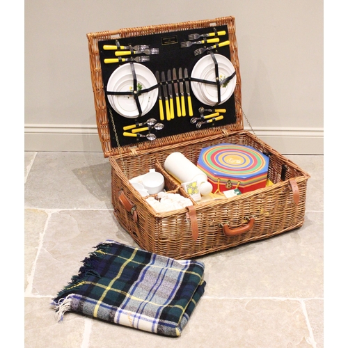 643 - A Fortnum and Masons wicker picnic hamper with contents, to include; a branded picnic blanket, 'Mela... 