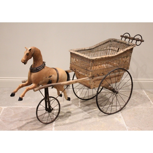 648 - A Victorian 'childs' push along horse and cart velocipede, the pony skin horse mounted on beech wood... 