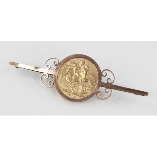 68 - A George V sovereign, dated 1912, set to a yellow metal bar brooch with scrolling surround, hinged p... 