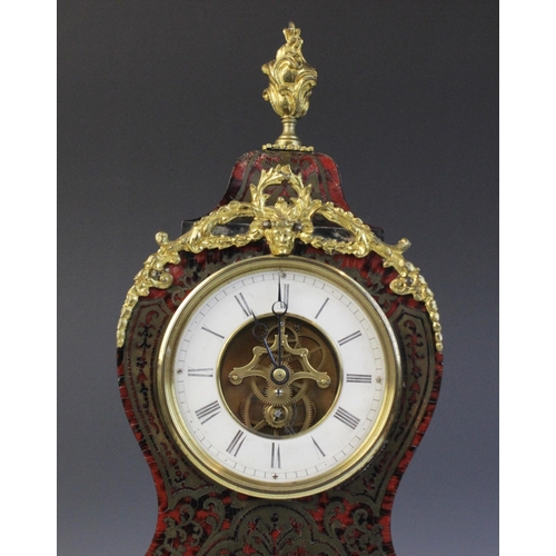 684 - A late 19th century French boule work and ebonised mantel timepiece, of waisted form with applied bo... 