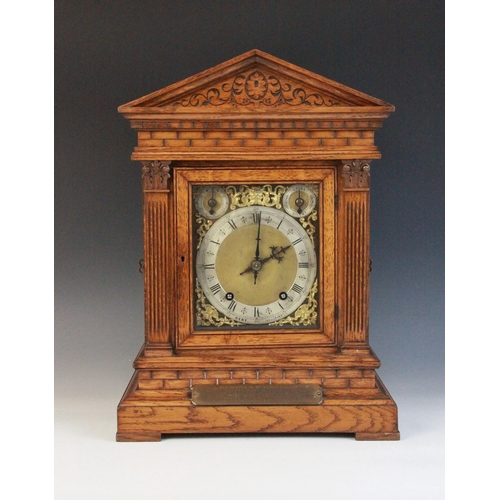 698 - A late 19th century oak cased German bracket clock, by Winterhalder and Hofmeier, the architectural ... 